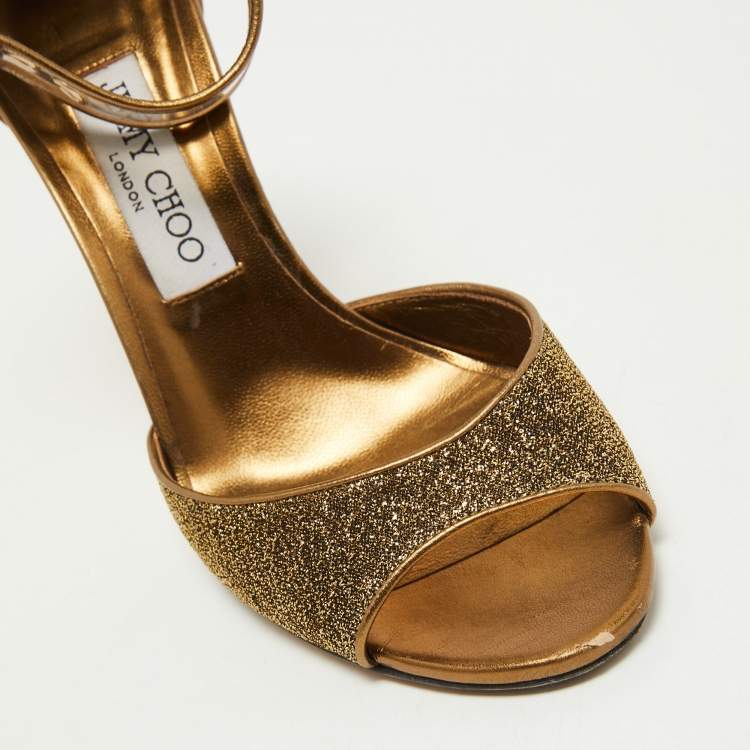 Pre Owned Jimmy Choo Metallic Lurex Fabric and PVC Moscow Ankle Strap Sandals Size 37.5