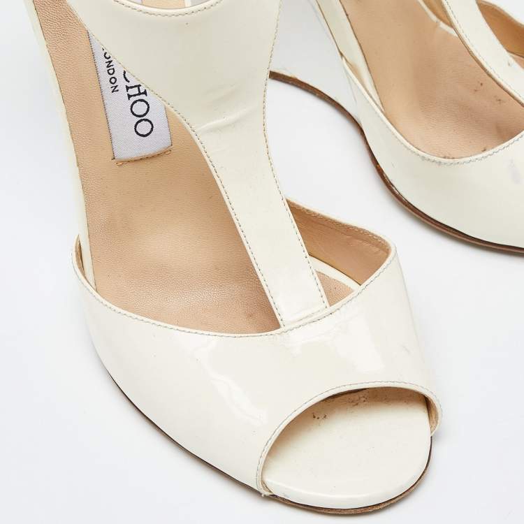 Pre Owned Jimmy Choo White/Cream Patent Leather Token T Strap Wedges Size 38.5