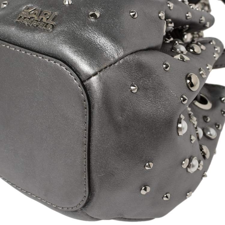 Pre Owned Karl Lagerfeld Metallic Silver Leather K/Rocky Studs Drawstring Bag           