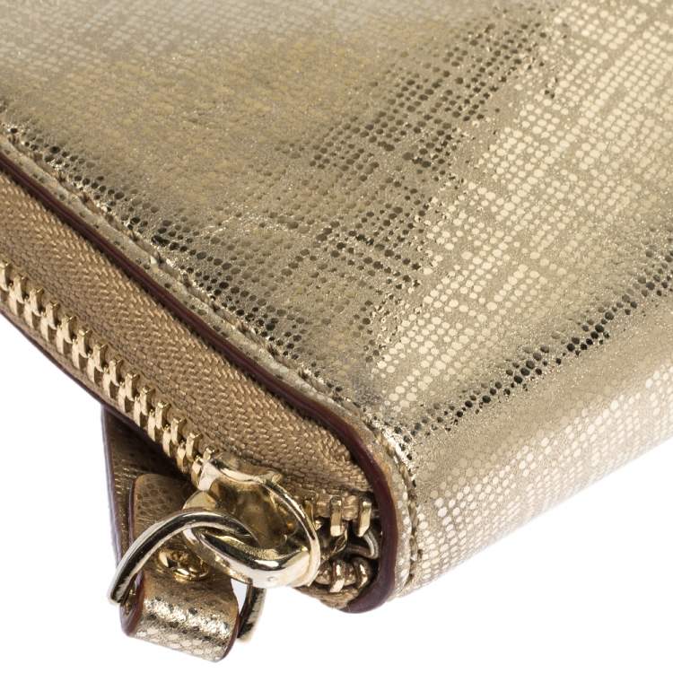 مملوكة مسبقًا Kate Spade Gold Leather Zip Around Long Clutch