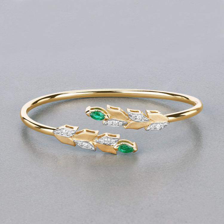 Pre Owned 0.50 cts Emerald and Diamond 14K Yellow Gold Bypass Bangle
