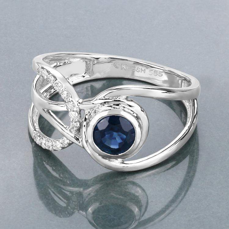 مملوكة مسبقًا 0.68 cts Blue Sapphire and Diamond 14K White Gold Crossover Ring US Size 7
