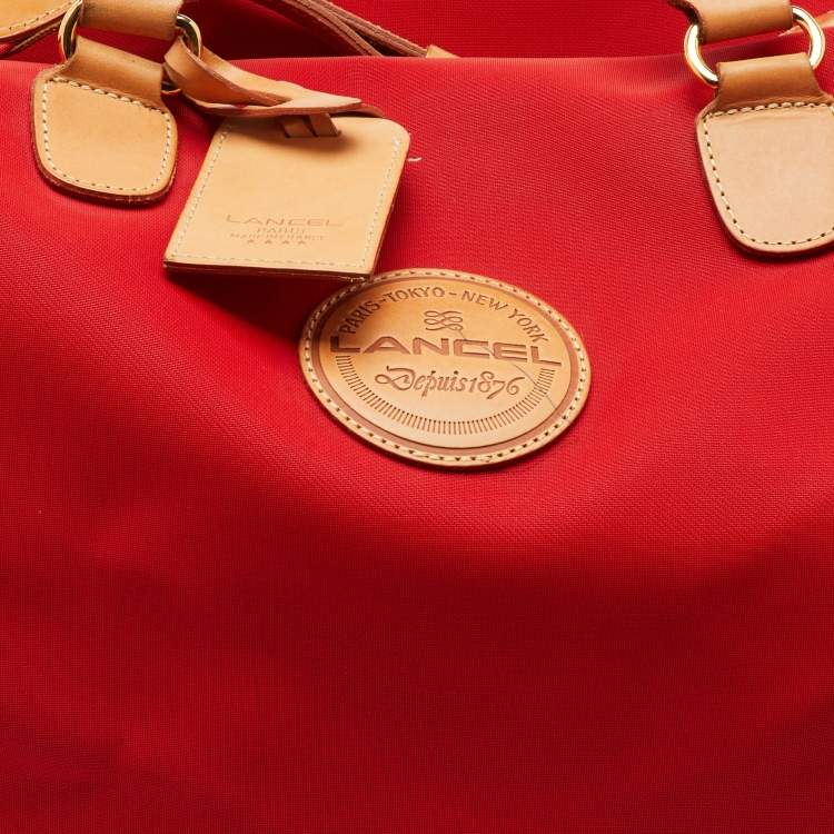 Pre Owned Lancel Red/Tan Canvas and Leather Trim Weekend Duffel Bag