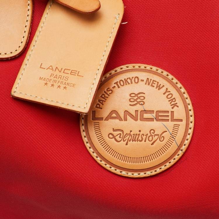 Pre Owned Lancel Red/Tan Canvas and Leather Trim Weekend Duffel Bag