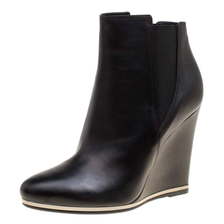 black leather wedge heel boots