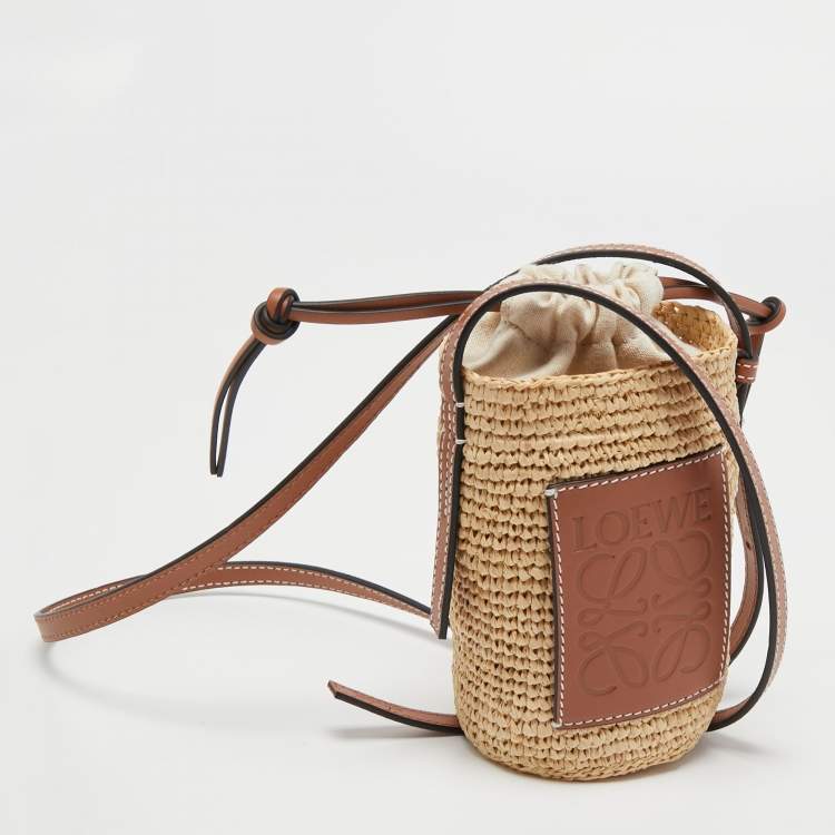 مملوكة مسبقًا  Loewe Beige/Brown Woven Raffia and Leather Cylinder Pocket Crossbody Bag