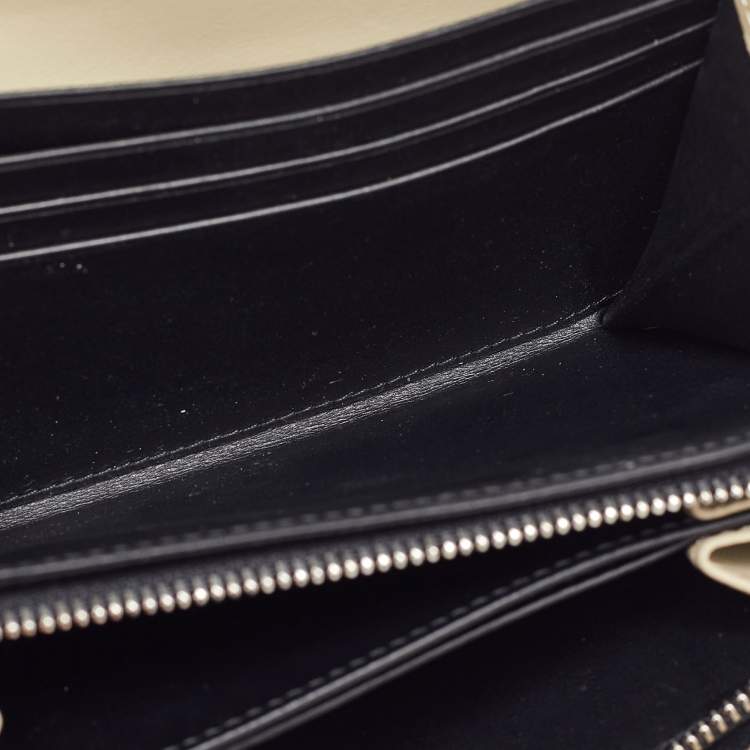Pre Owned Loewe Beige Signature Embossed Leather Compact Wallet