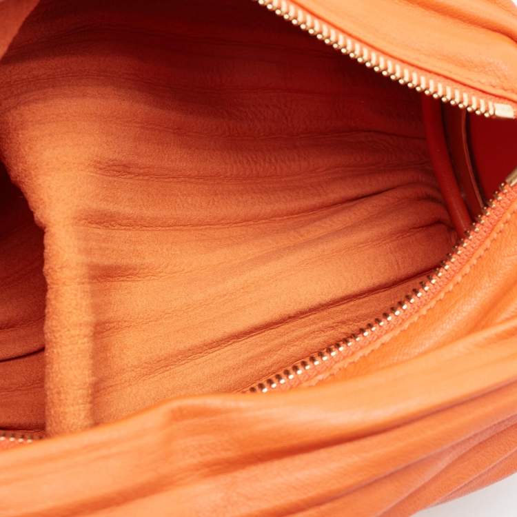 Pre Owned Loewe Orange Leather Pleated Braclet Pouch Bag 