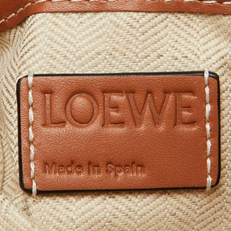 Pre Owned Loewe Beige/Tan Woven Raffia and Leather Slit Pochette Bag