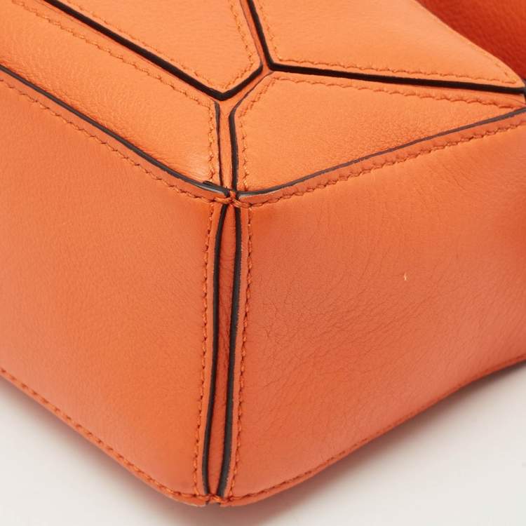 Pre Owned Loewe Orange Leather Mini Puzzle Edge Top Handle Bag