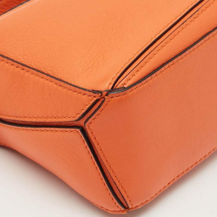Pre Owned Loewe Orange Leather Mini Puzzle Edge Top Handle Bag