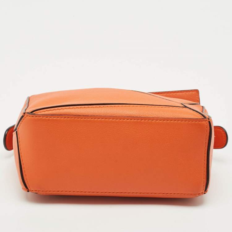 Pre Owned Loewe Orange Leather Mini Puzzle Edge Top Handle Bag