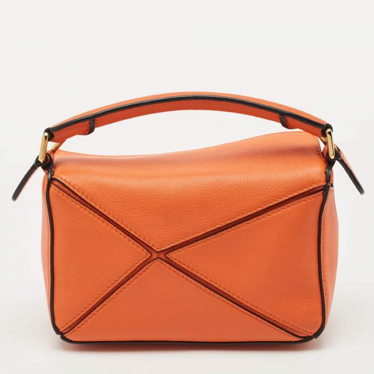Pre Owned Loewe Orange Leather Mini Puzzle Edge Top Handle Bag