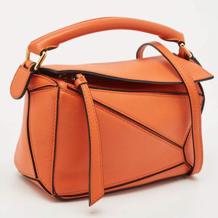 Pre Owned Loewe Orange Leather Mini Puzzle Edge Top Handle Bag