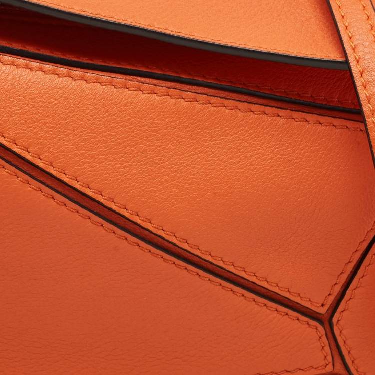 Pre Owned Loewe Orange Leather Mini Puzzle Edge Top Handle Bag