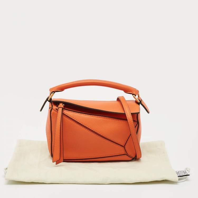 Pre Owned Loewe Orange Leather Mini Puzzle Edge Top Handle Bag