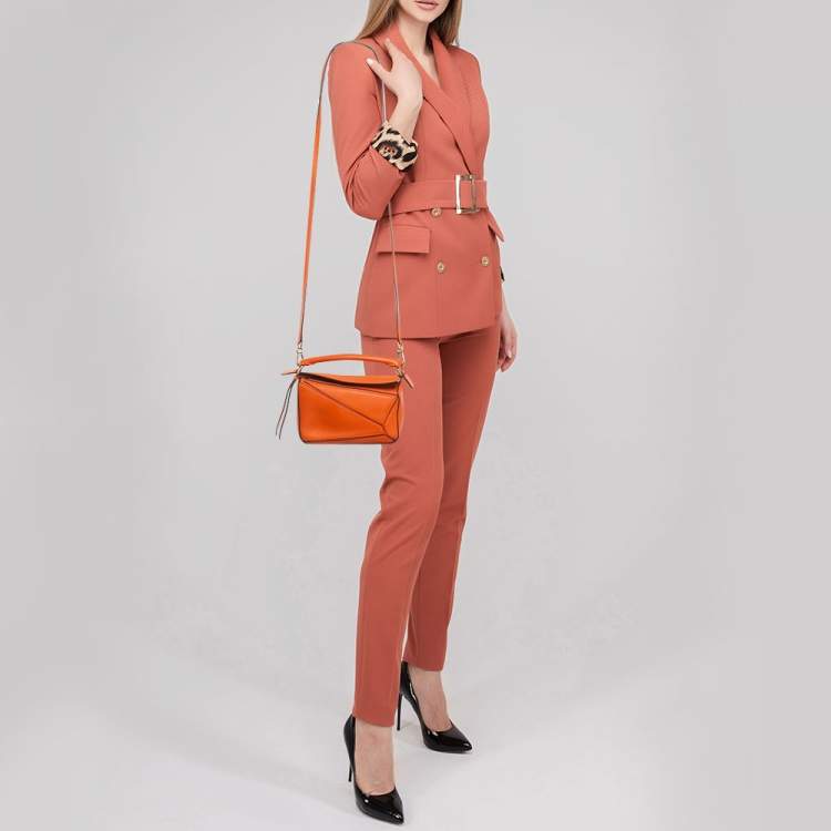 Pre Owned Loewe Orange Leather Mini Puzzle Edge Top Handle Bag