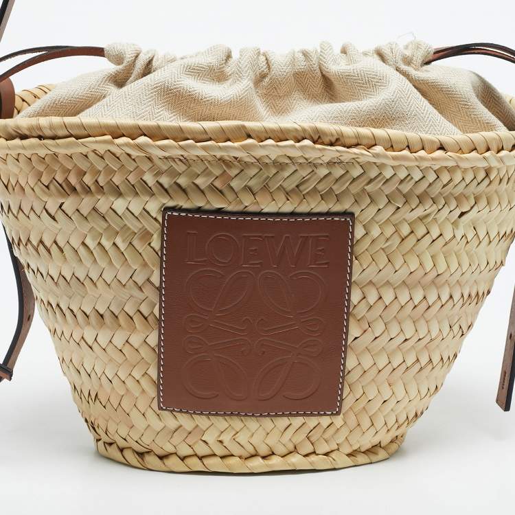 Pre Owned Loewe Brown/Cream Woven Raffia and Leather Drawstring Basket Bag