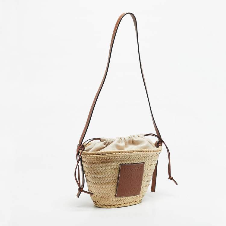 Pre Owned Loewe Brown/Cream Woven Raffia and Leather Drawstring Basket Bag