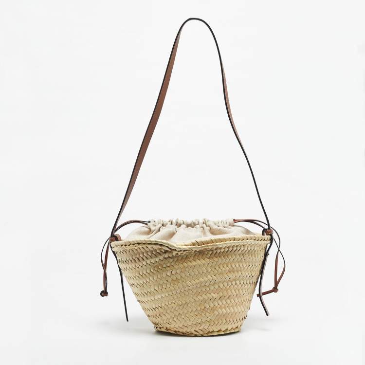 Pre Owned Loewe Brown/Cream Woven Raffia and Leather Drawstring Basket Bag