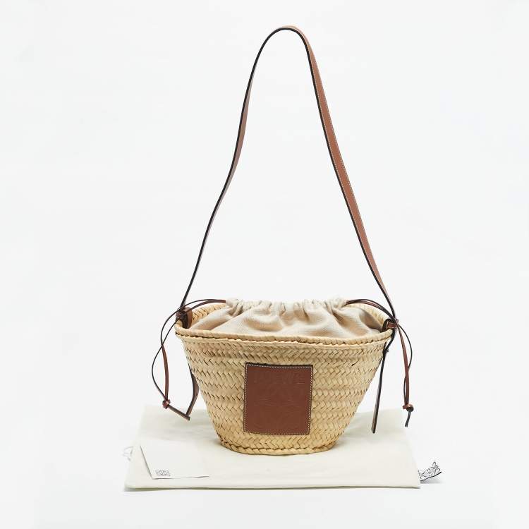 Pre Owned Loewe Brown/Cream Woven Raffia and Leather Drawstring Basket Bag