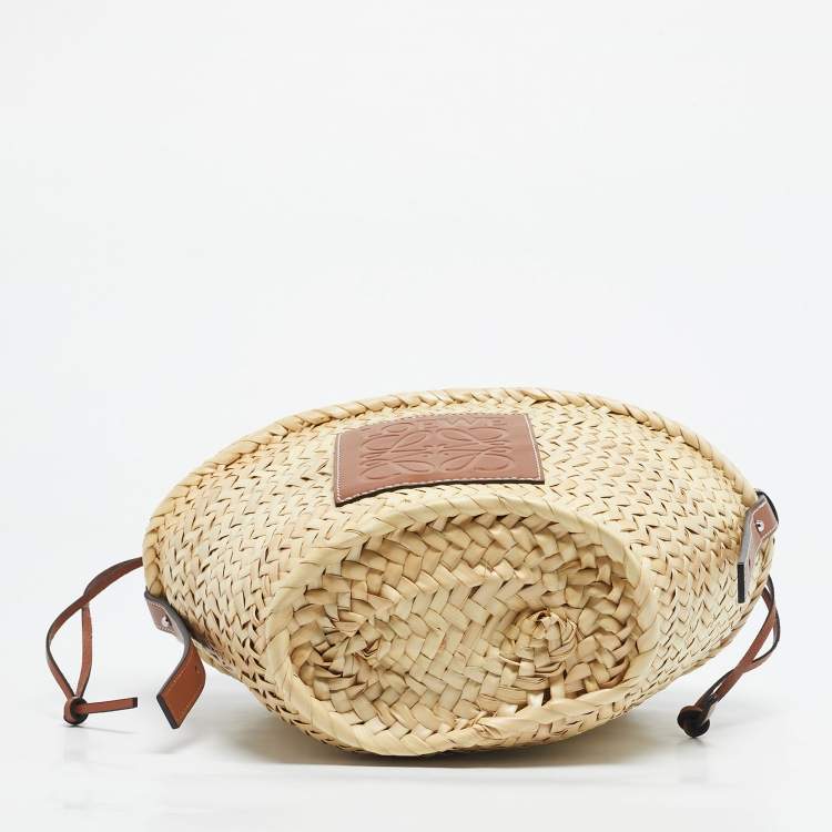 Pre Owned Loewe Brown/Cream Woven Raffia and Leather Drawstring Basket Bag