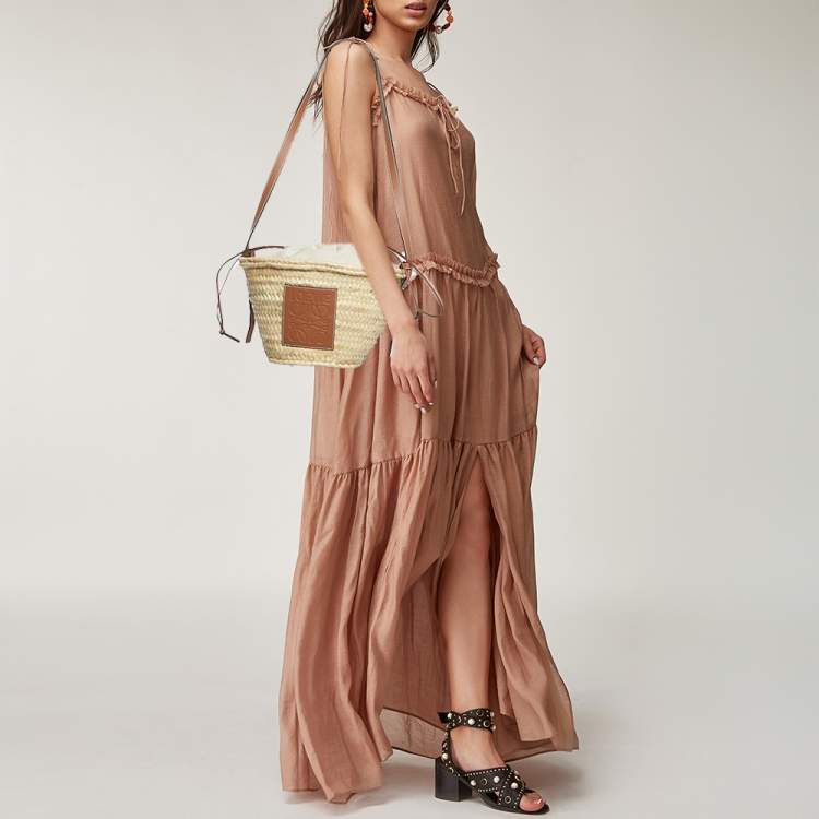 Pre Owned Loewe Brown/Cream Woven Raffia and Leather Drawstring Basket Bag