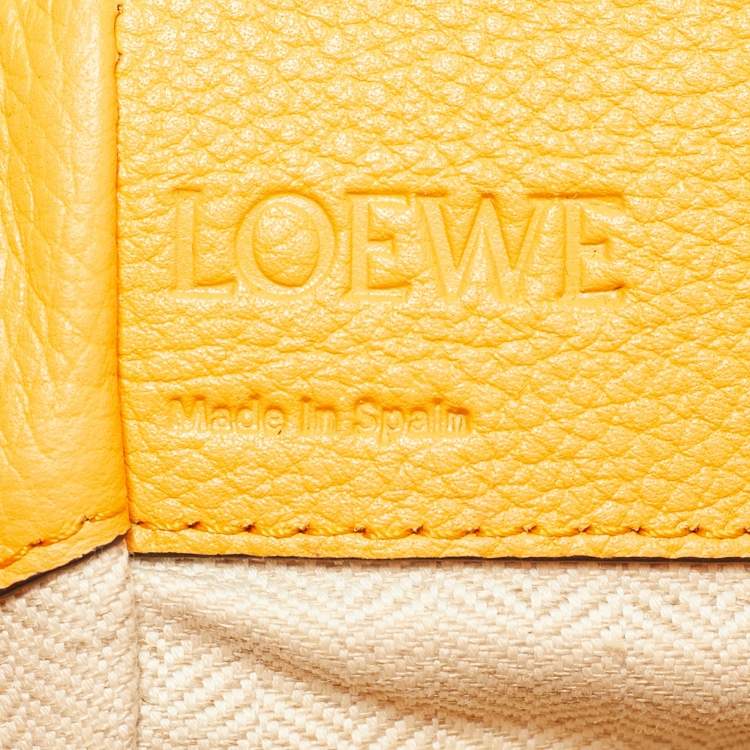 Pre Owned Loewe Orange Leather Mini Hammock Drawstring Bag