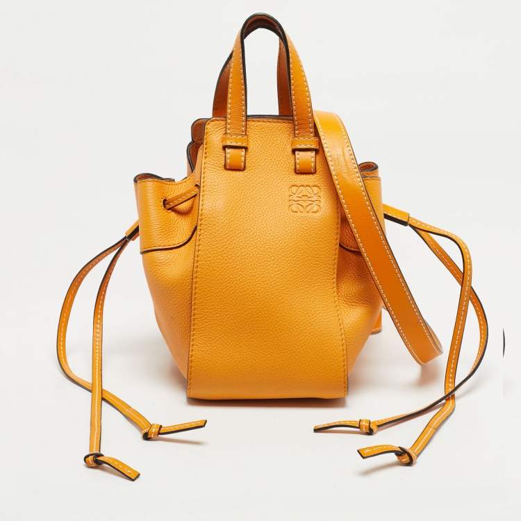 Pre Owned Loewe Orange Leather Mini Hammock Drawstring Bag
