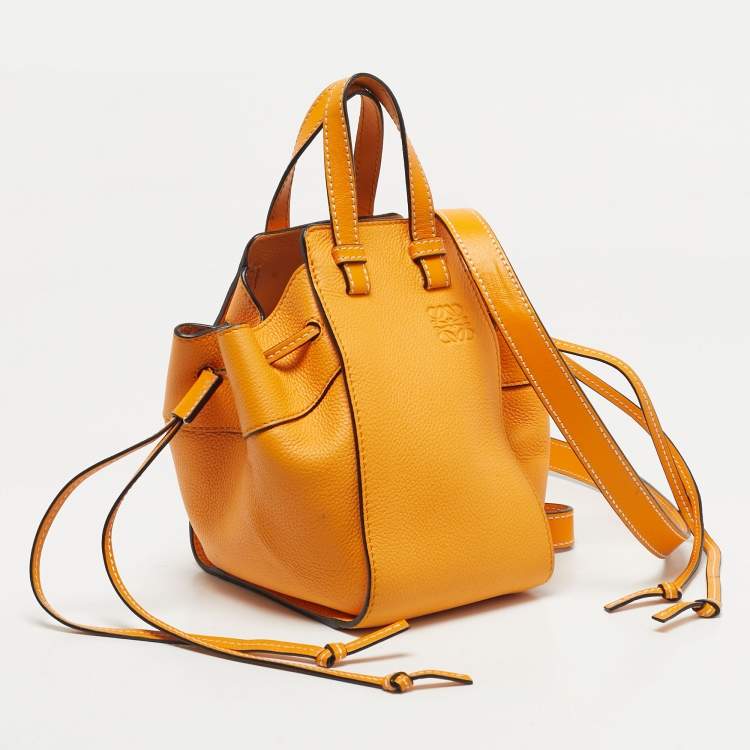 Pre Owned Loewe Orange Leather Mini Hammock Drawstring Bag