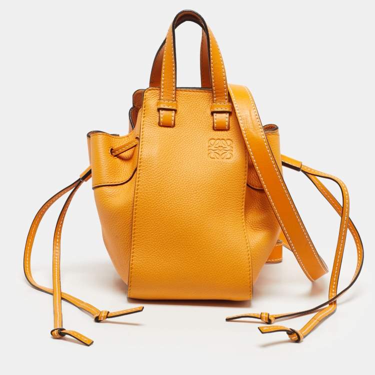 Pre Owned Loewe Orange Leather Mini Hammock Drawstring Bag