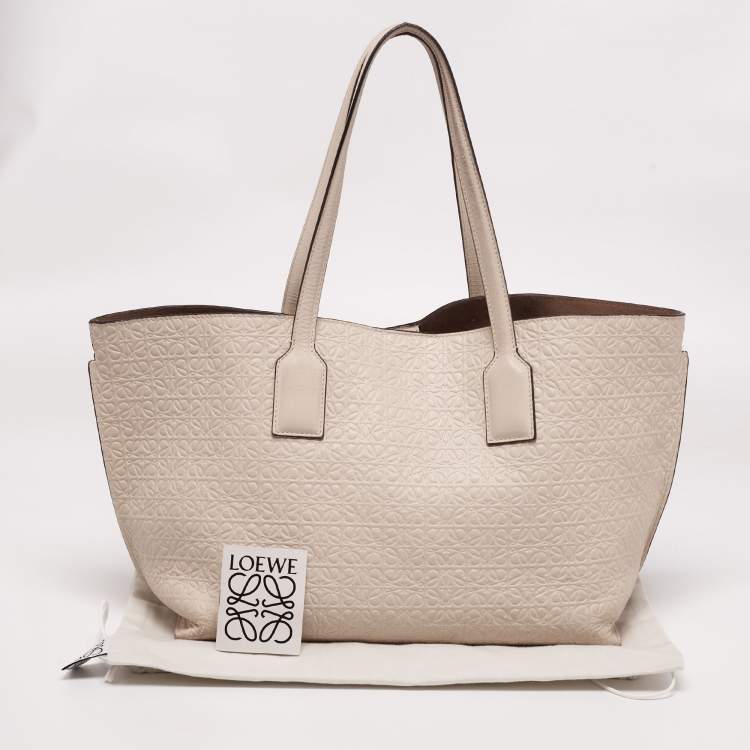 Pre Owned Loewe Beige Logo Embossed Leather T Shopper Tote