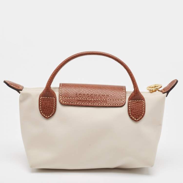 Pre Owned Longchamp Off White Nylon Le Pliage Handle Pouch
