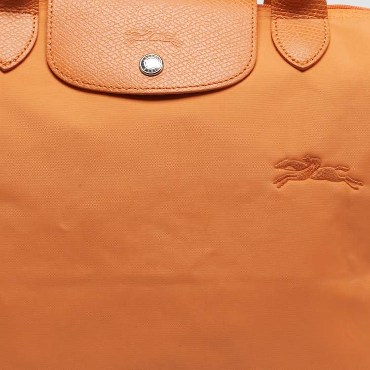 مملوكة مسبقًا Longchamp Le Pliage Medium Orange Nylon Tote