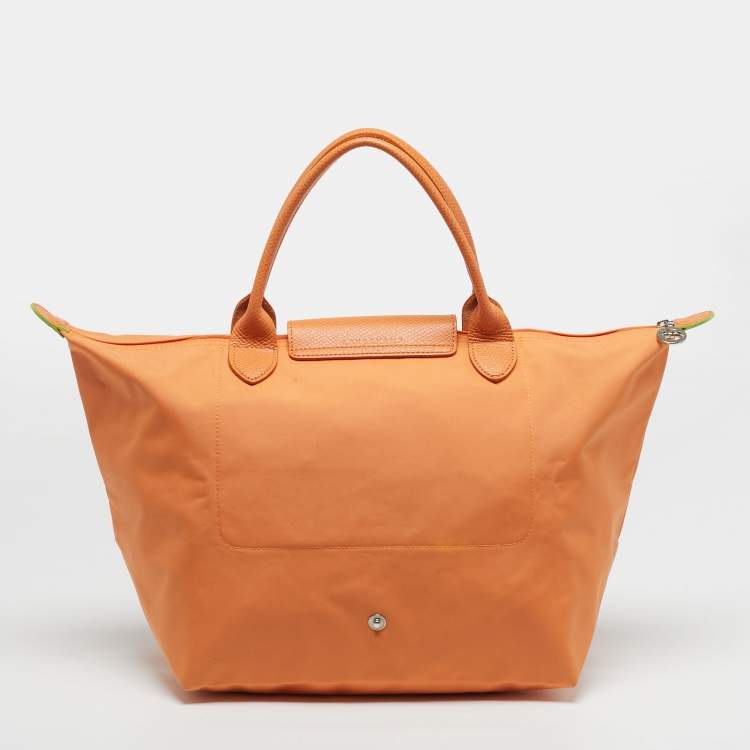 مملوكة مسبقًا Longchamp Le Pliage Medium Orange Nylon Tote
