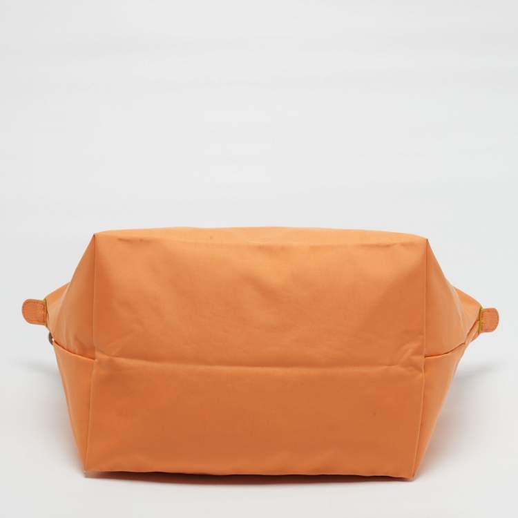 مملوكة مسبقًا Longchamp Le Pliage Medium Orange Nylon Tote