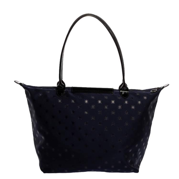 Pre Owned Longchamp Navy Blue/Black Star Print Nylon and Patent Leather Medium Le Pliage Tote