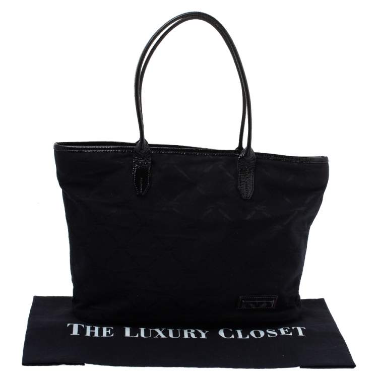 Pre Owned Longchamp Black Logo Embossed Canvas Tote 