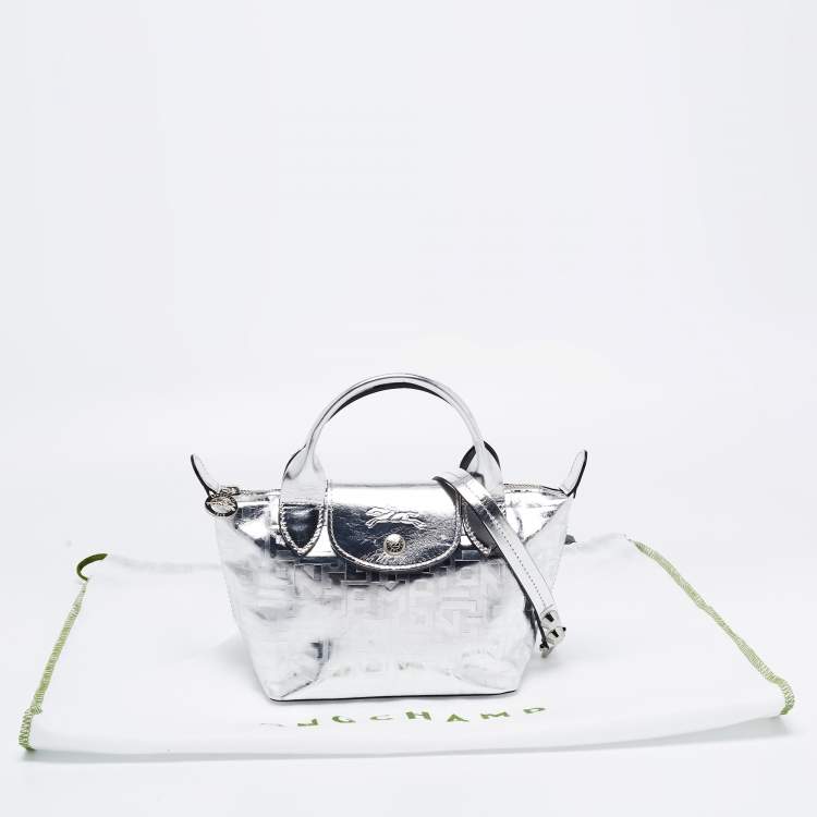 Pre Owned Longchamp Silver Monogram Embossed Leather XS Le Pliage Tote