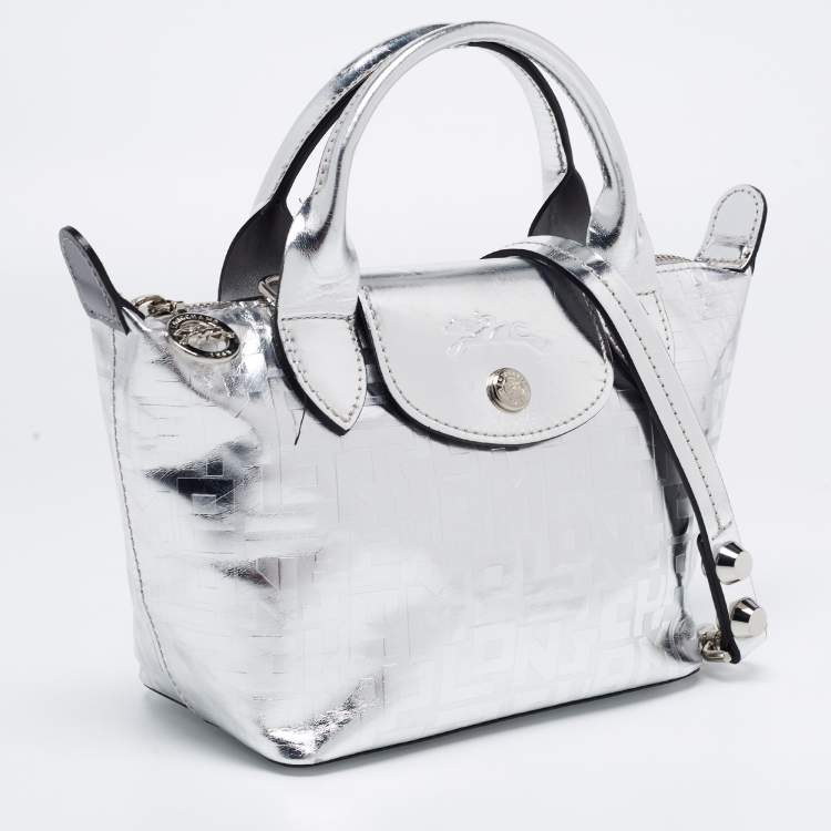 Pre Owned Longchamp Silver Monogram Embossed Leather XS Le Pliage Tote