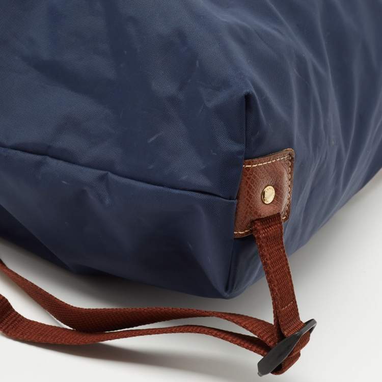 Pre Owned Longchamp Navy Blue/Brown Nylon and Leather Le Pliage Drawstring Backpack