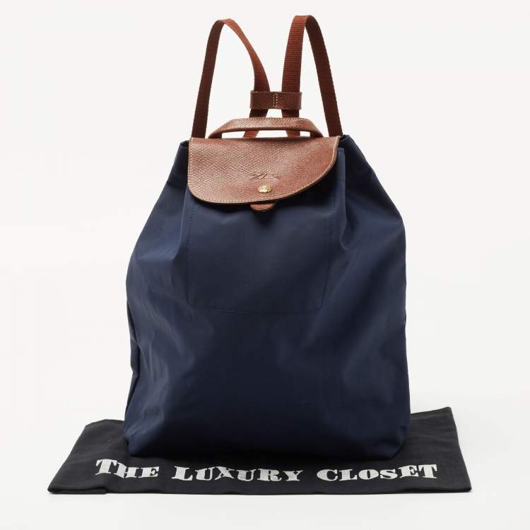 Pre Owned Longchamp Navy Blue/Brown Nylon and Leather Le Pliage Drawstring Backpack