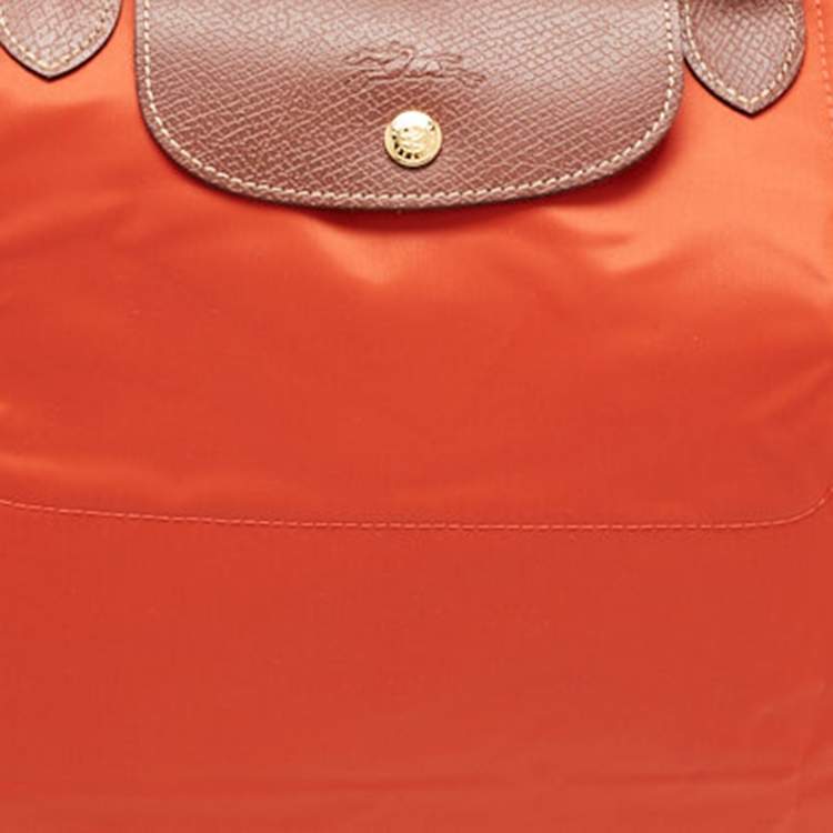 Pre Owned Longchamp Orange Nylon Le Pliage Travel Tote