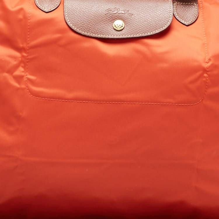 Pre Owned Longchamp Orange Nylon Le Pliage Travel Tote