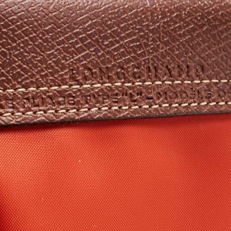 Pre Owned Longchamp Orange Nylon Le Pliage Travel Tote