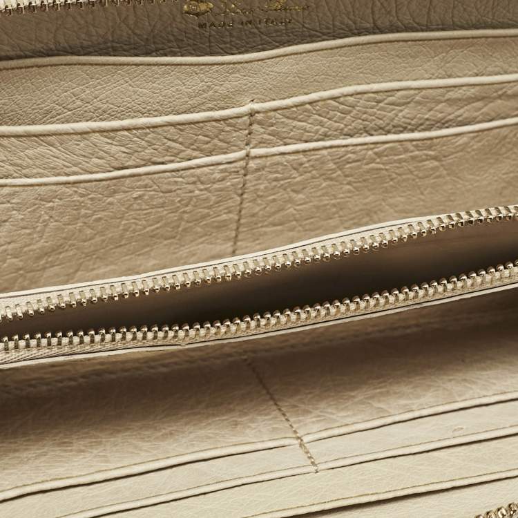 Pre Owned Loro Piana Ivory Ostrich Zip Around Wallet
