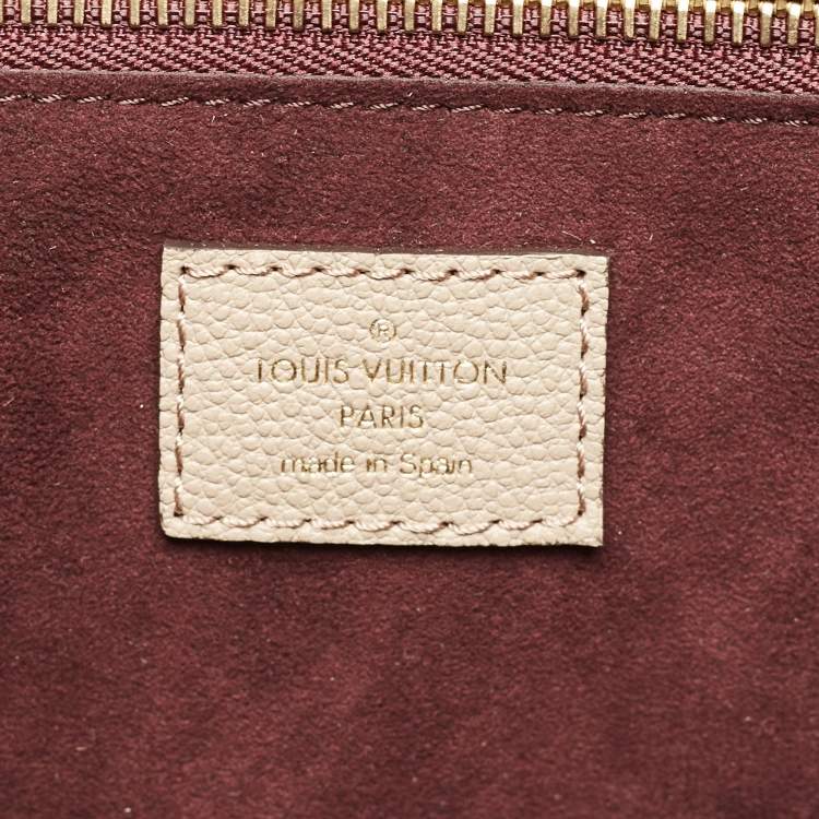 Pre Owned Louis Vuitton Tourterelle Monogram Giant Empreinte Leather Neverfull MM Bag