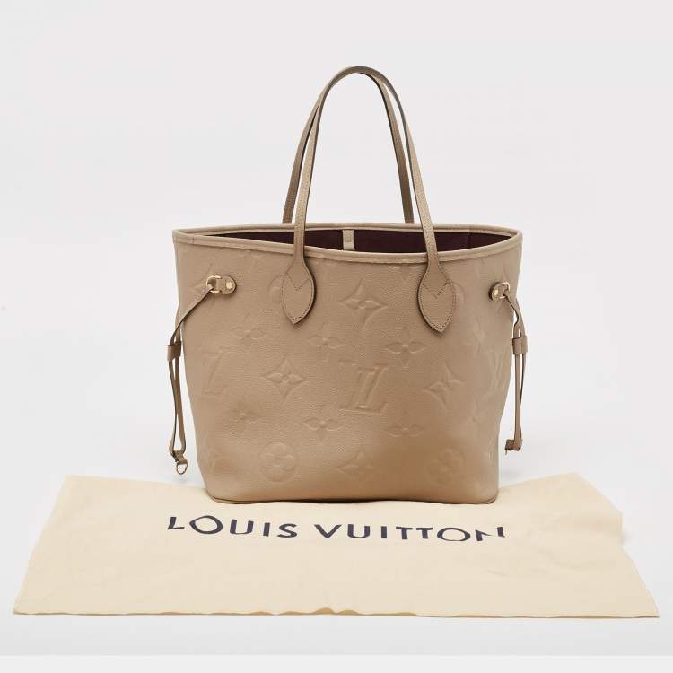 Pre Owned Louis Vuitton Tourterelle Monogram Giant Empreinte Leather Neverfull MM Bag