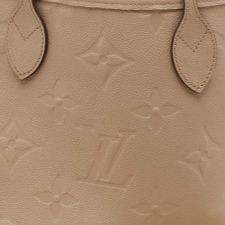 Pre Owned Louis Vuitton Tourterelle Monogram Giant Empreinte Leather Neverfull MM Bag