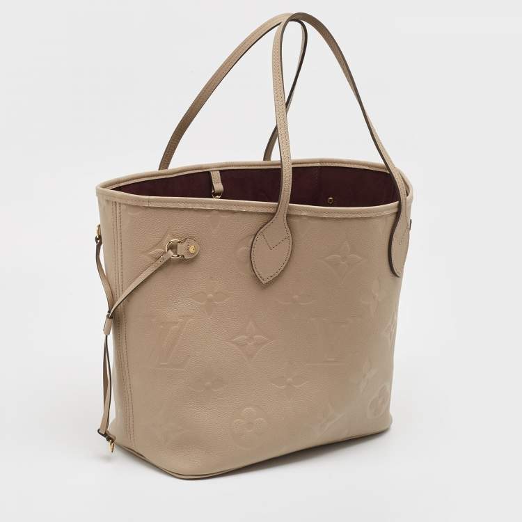 Pre Owned Louis Vuitton Tourterelle Monogram Giant Empreinte Leather Neverfull MM Bag